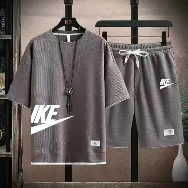 2025 Men's breathable short-sleeved T-shirt + jogging shorts two-piece summer fashion quick-dry fitness leisure sports suit - Ellianto fashion Men's