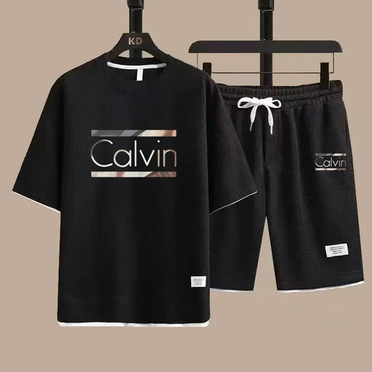 The new European men's casual sportswear two-piece set for the summer of 2025, featuring short sleeves, round necks and sports s - Ellianto fashion Men's