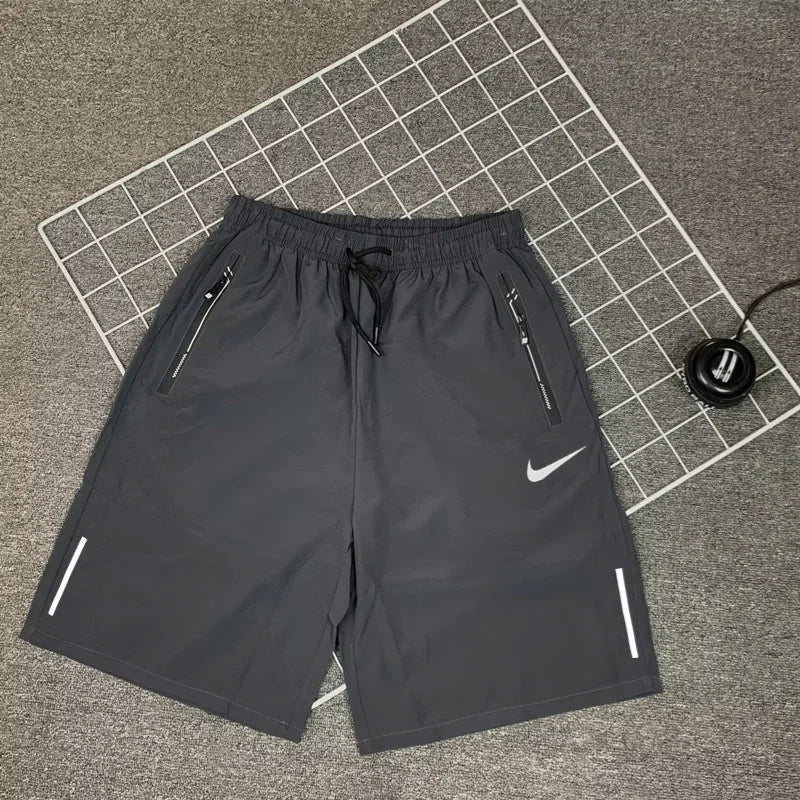 Nike Men's Breathable Shorts, Reflective Design, Adjustable Drawstring, Water-resistant Sweatpants, Solid Color, Black/Grey - Ellianto fashion Men's