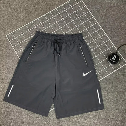 Nike Men's Breathable Shorts, Reflective Design, Adjustable Drawstring, Water-resistant Sweatpants, Solid Color, Black/Grey - Ellianto fashion Men's