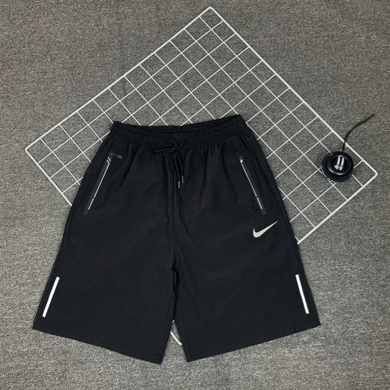 Nike Men's Breathable Shorts, Reflective Design, Adjustable Drawstring, Water-resistant Sweatpants, Solid Color, Black/Grey - Ellianto fashion Men's