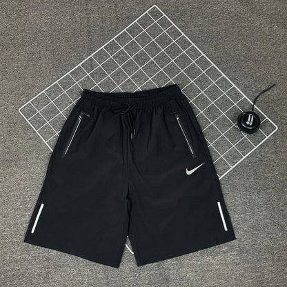 Nike Men's Breathable Shorts, Reflective Design, Adjustable Drawstring, Water-resistant Sweatpants, Solid Color, Black/Grey - Ellianto fashion Men's
