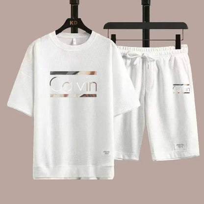 The new European men's casual sportswear two-piece set for the summer of 2025, featuring short sleeves, round necks and sports s - Ellianto fashion Men's
