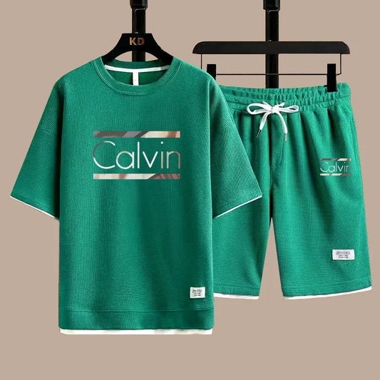 The new European men's casual sportswear two-piece set for the summer of 2025, featuring short sleeves, round necks and sports s - Ellianto fashion Men's