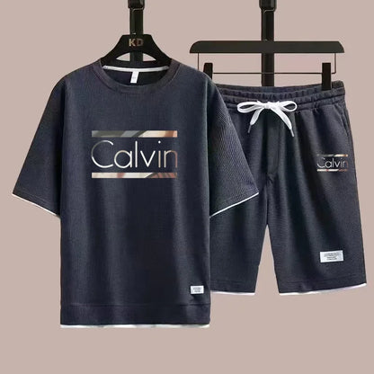 The new European men's casual sportswear two-piece set for the summer of 2025, featuring short sleeves, round necks and sports s - Ellianto fashion Men's