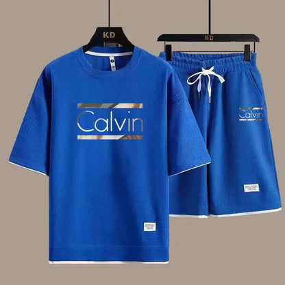 The new European men's casual sportswear two-piece set for the summer of 2025, featuring short sleeves, round necks and sports s - Ellianto fashion Men's