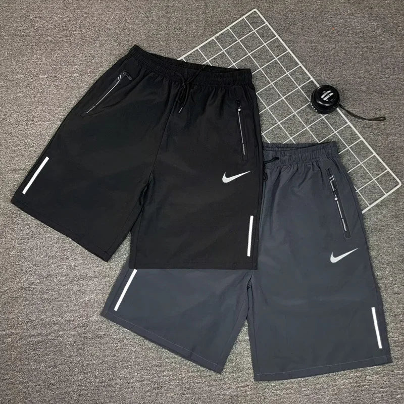 Nike Men's Breathable Shorts, Reflective Design, Adjustable Drawstring, Water-resistant Sweatpants, Solid Color, Black/Grey - Ellianto fashion Men's